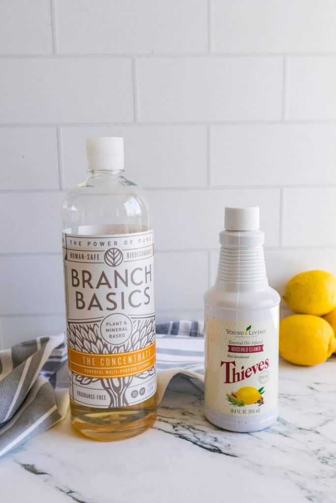bottle of Branch Basics next to Thieves Cleaner