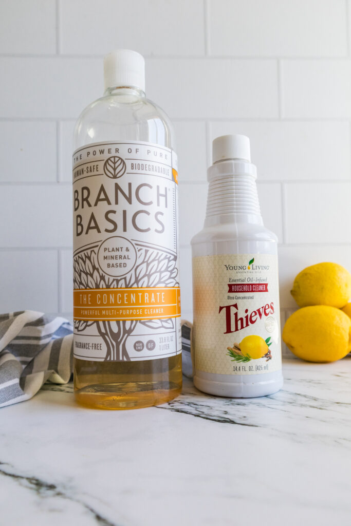 bottle of Branch Basics next to Thieves Cleaner
