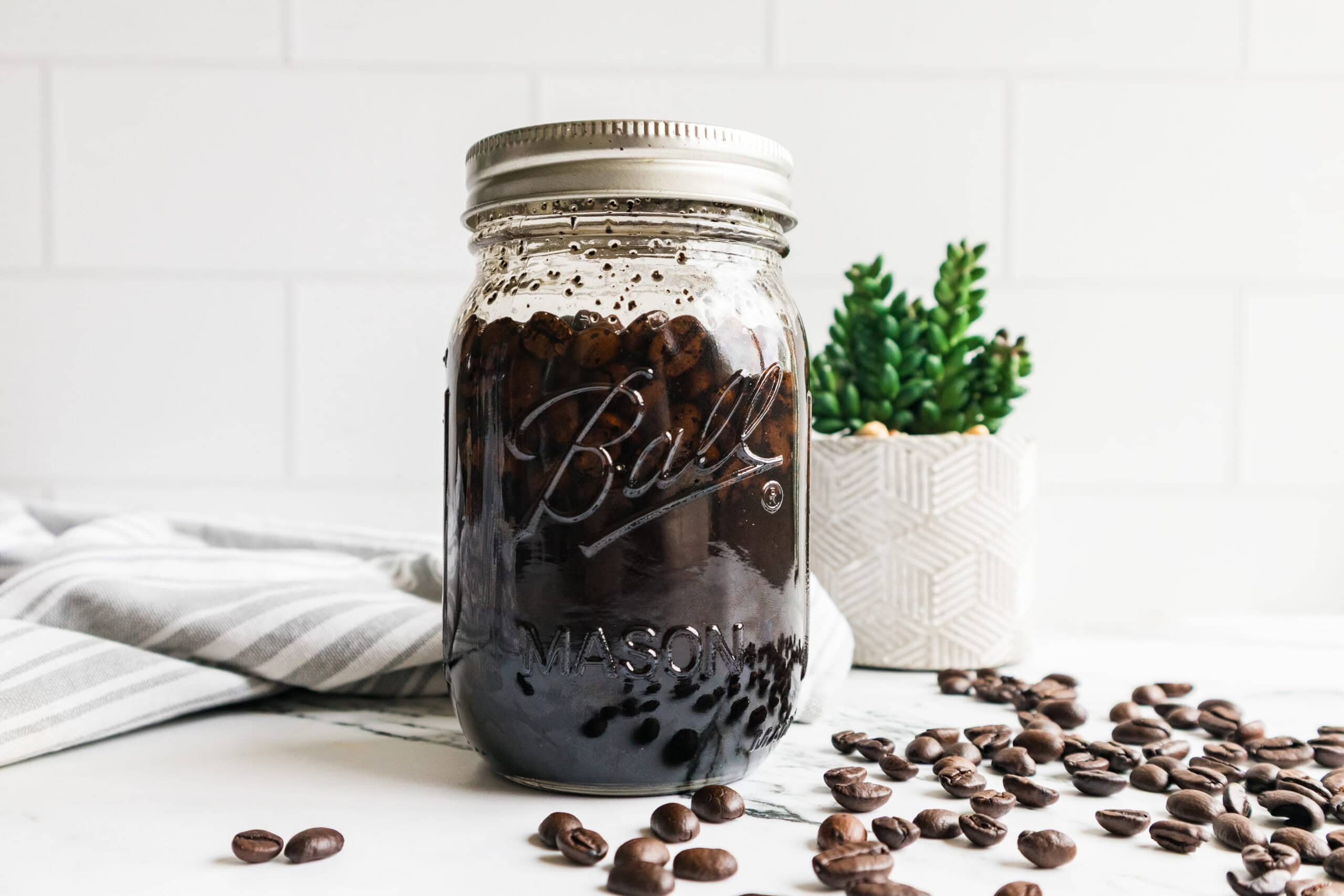 Coffee infused oil in a glass jar