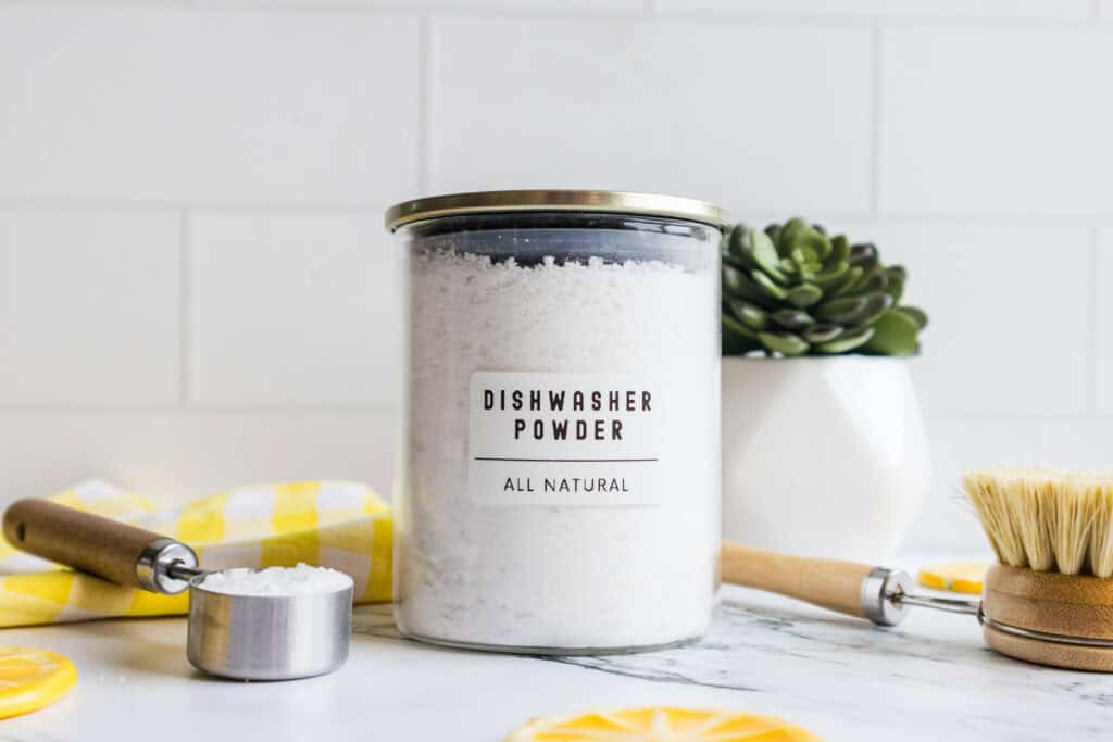 diy dishwasher detergent powder in a glass jar for storage