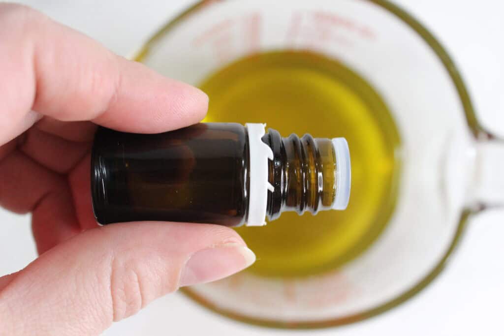 adding essential oils to melted oil and  beeswax