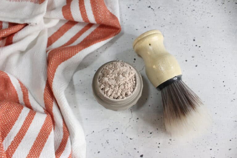 dry shampoo powder in a silicone jar