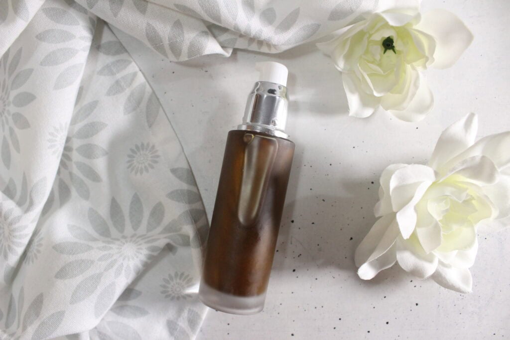 tanning oil pump bottle laying on counter