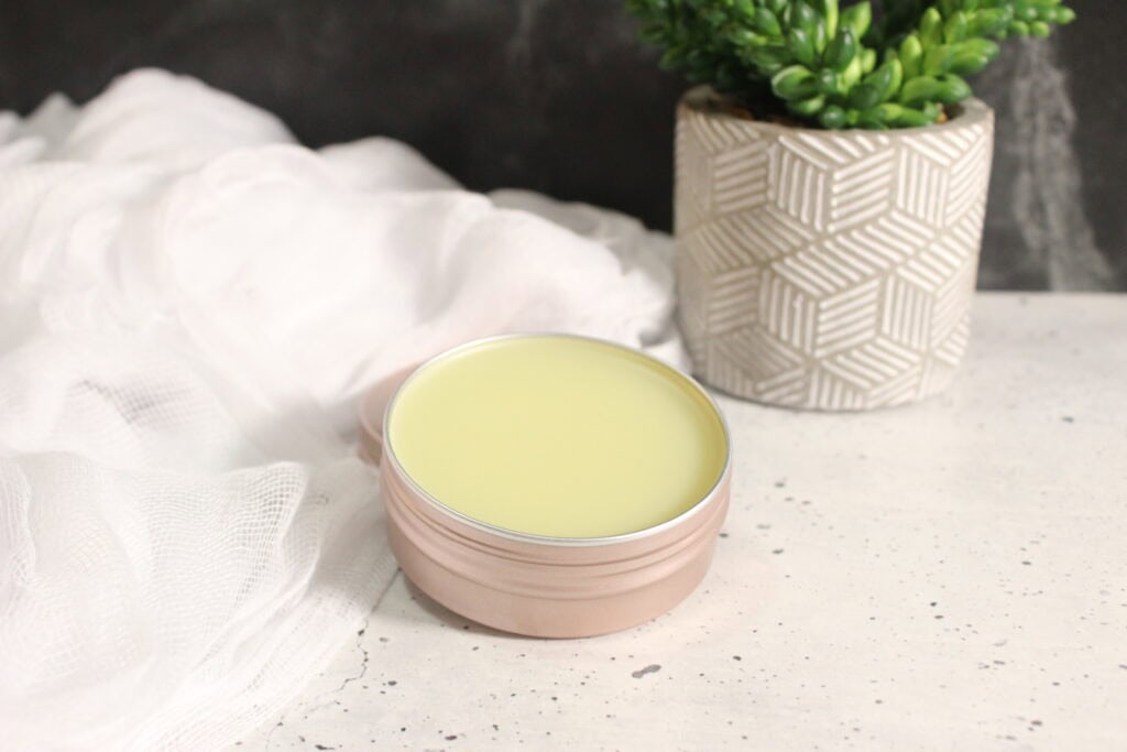 DIY Bug Bite Balm in a pink container