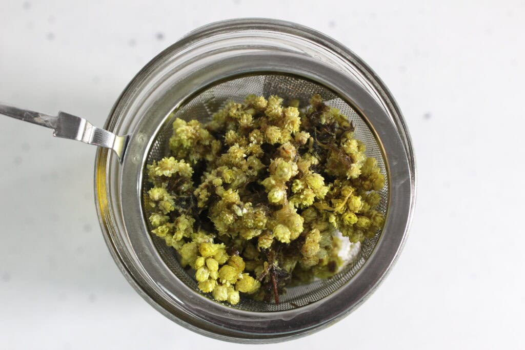 straining out the flowers