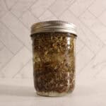 All ingredients in a jar infusing for the herbal extract