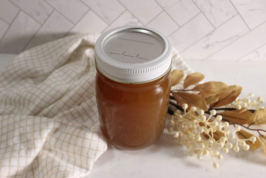 herbal cough syrup in a glass jar shut