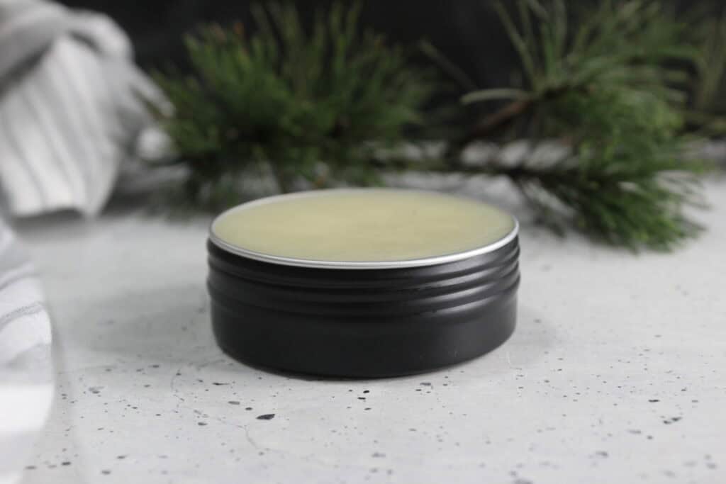 pine salve in a black tin 