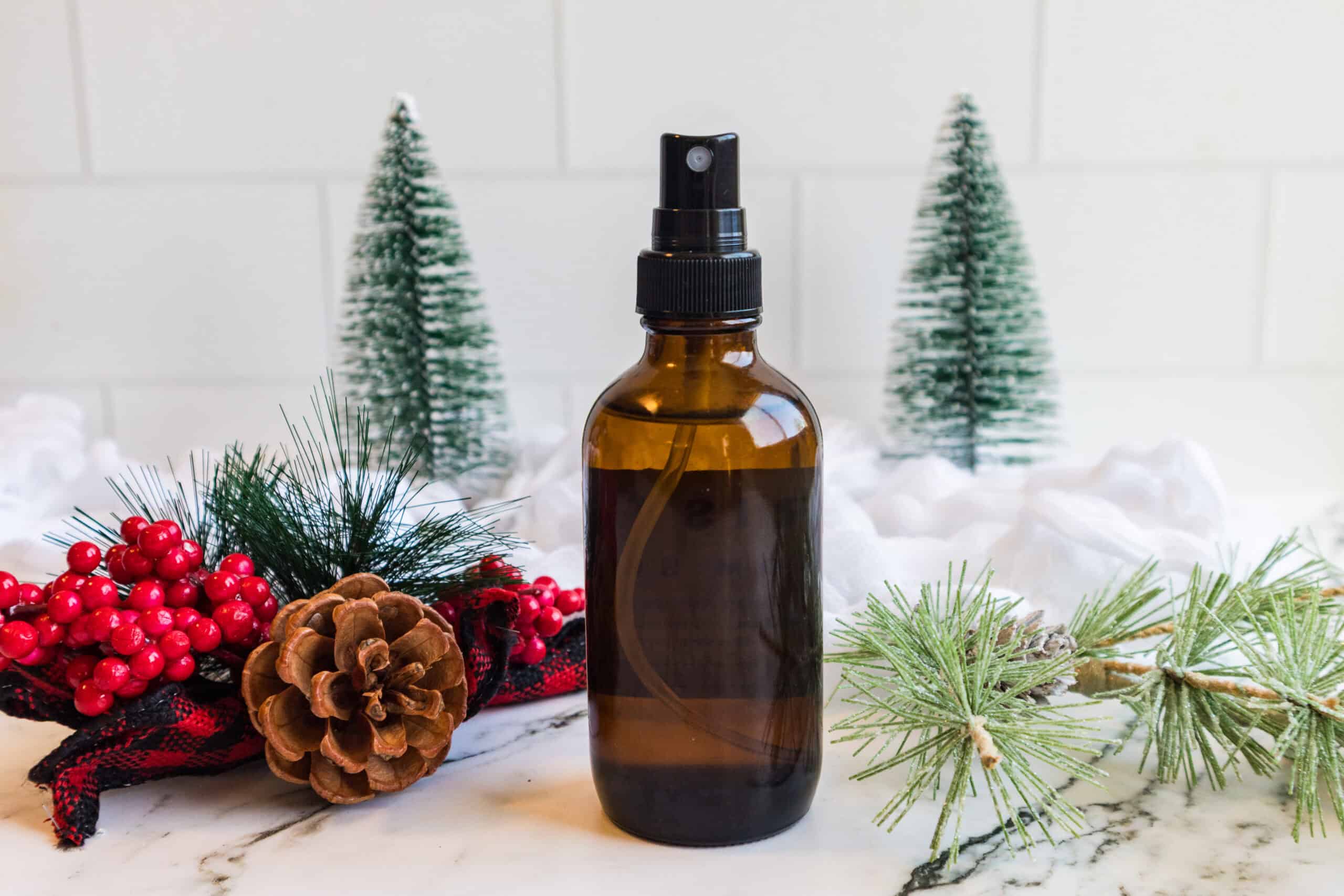 DIY Christmas Room Sprays in amber spray bottle