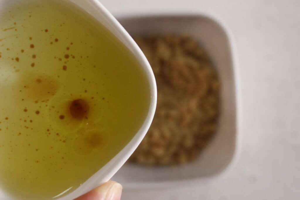 adding in  the oil to the sugar