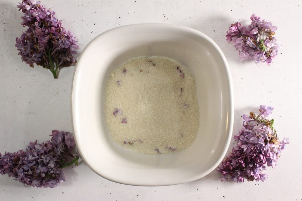 Sugar in a white bowl.