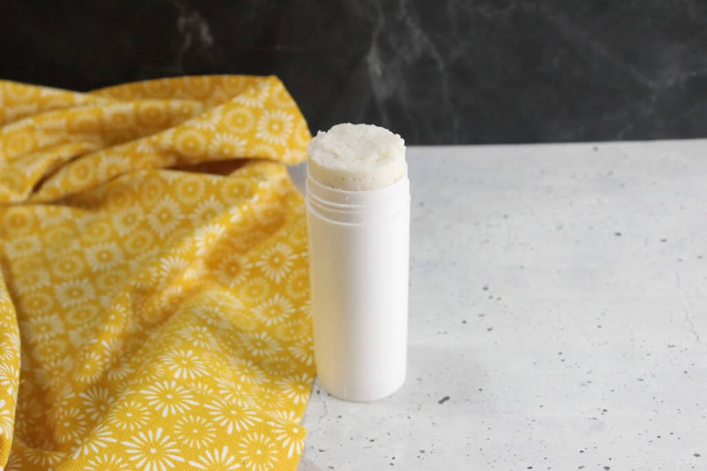 My DIY Stain Remover Stick on the counter next to a towel