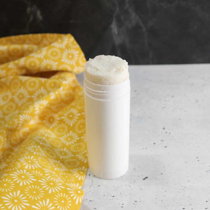 My DIY Stain Remover Stick on the counter next to a towel