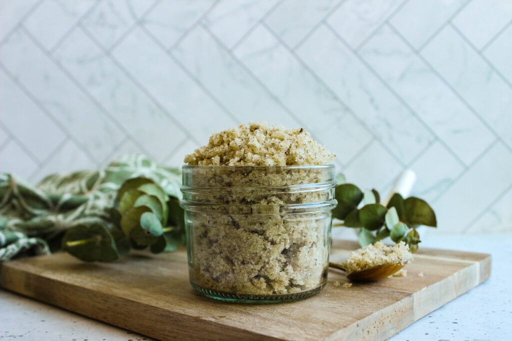Homemade eucalyptus sugar scrub with natural ingredients for exfoliation and soothing skin care.