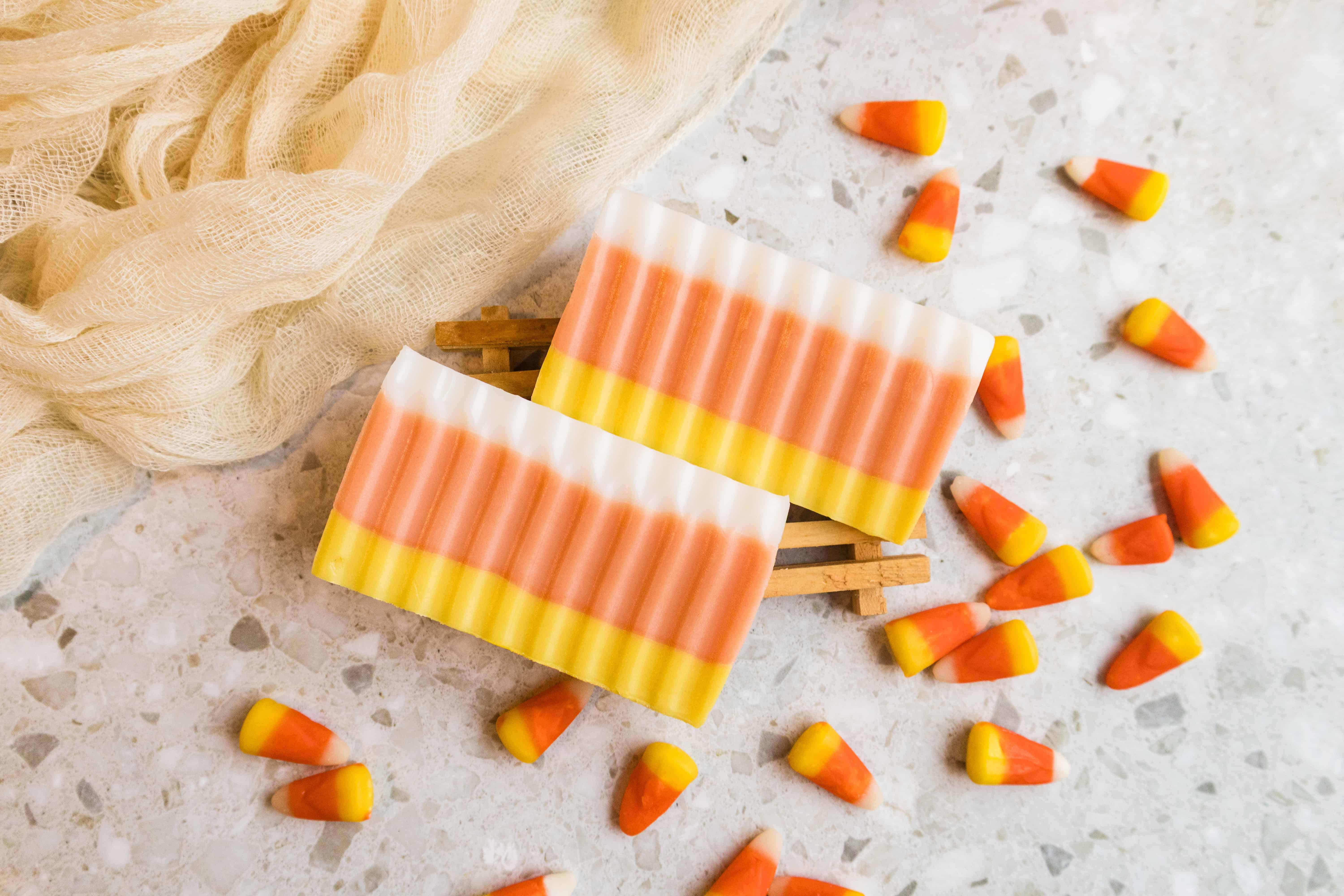 Finished candy corn soap bars with candy corn pieces.