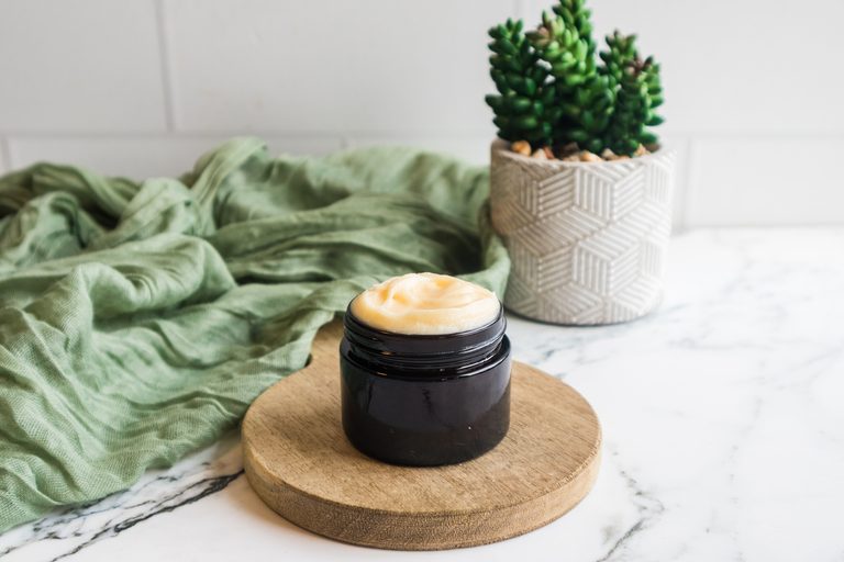 Tallow beard butter jar on wooden tray